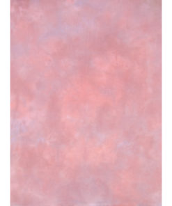 A sheet of hand-dyed fabric, mostly dusty pink, with mottling of light blue