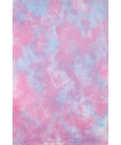 A sheet of hand-dyed fabric, mostly magenta, with mottling of sky blue