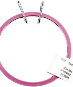 A large plastic embroidery hoops, closed with a pair of metal spring clamps.