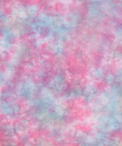 A sheet of hand-dyed fabric, mostly sky blue, with mottling of magenta
