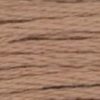 A close-up view of embroidery thread skeins, held taught horizontally. The shade is a tawny brown, like the shore of a swimming hole.