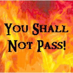 Brilliant reds, yellows, and oranges form a fire background, behind the black text, "You Shall Not Pass!"